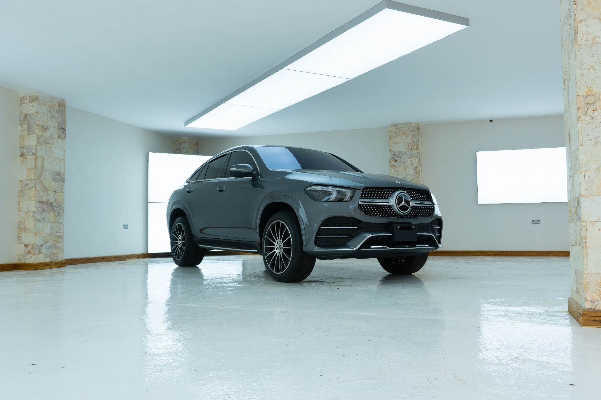 Mercedes-Benz GLE 400d Coupé under Donga showroom lighting