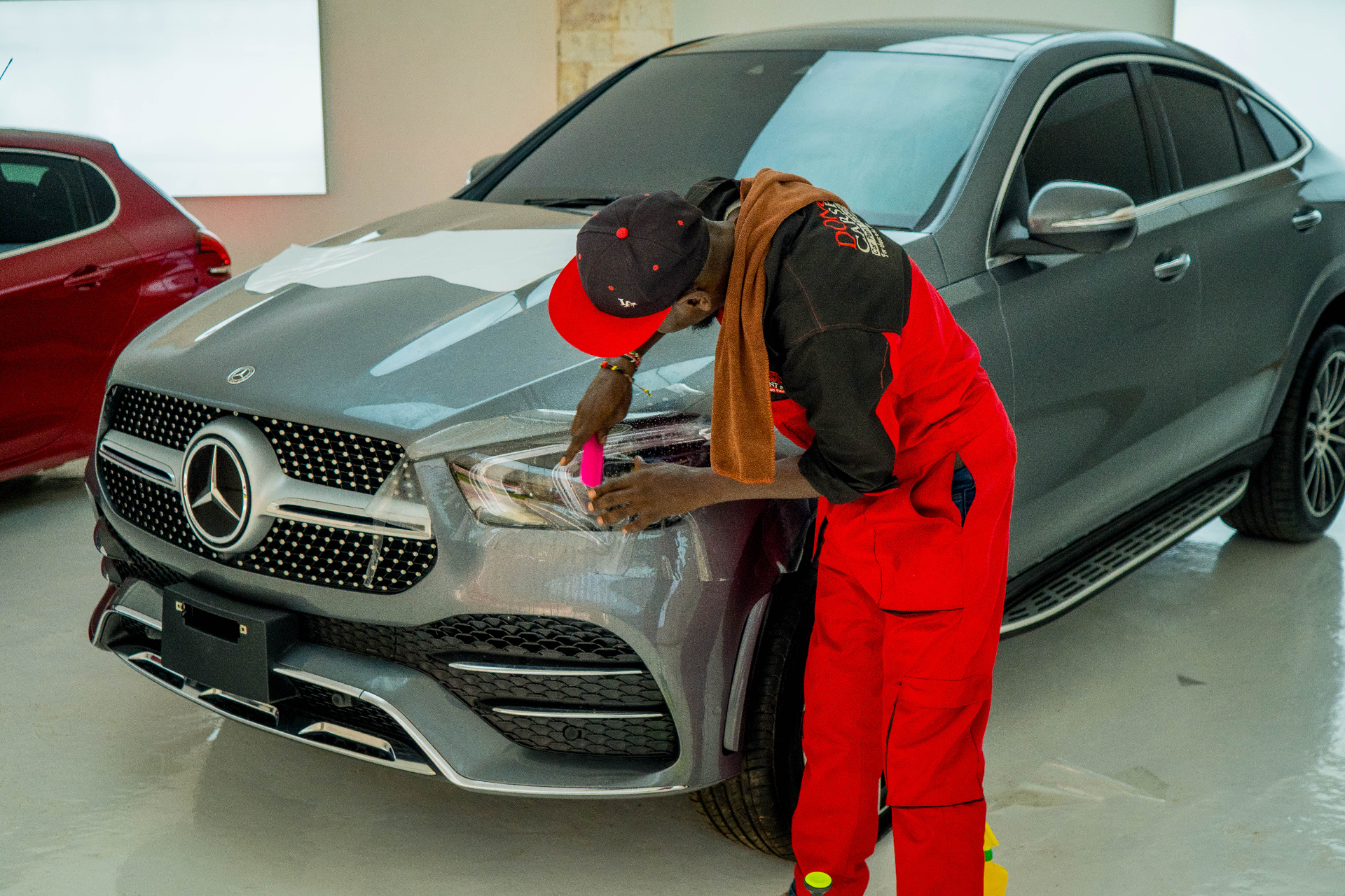 Squeegee work on Mercedes GLE headlight PPF at Donga